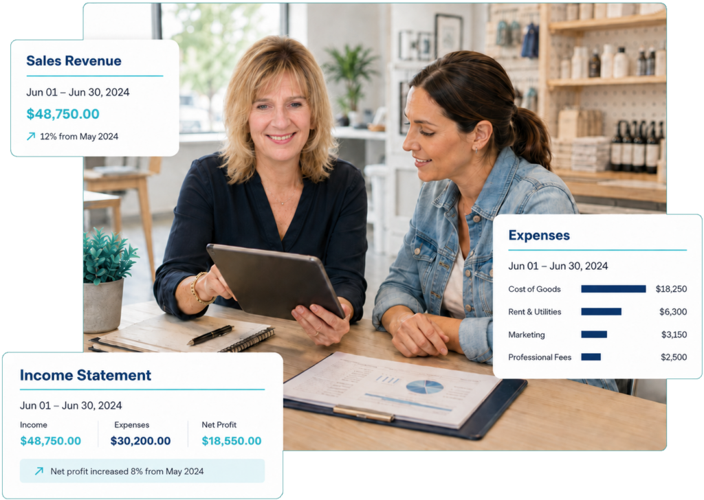 Bookkeeper reviewing financial reports with a small business owner using a digital dashboard